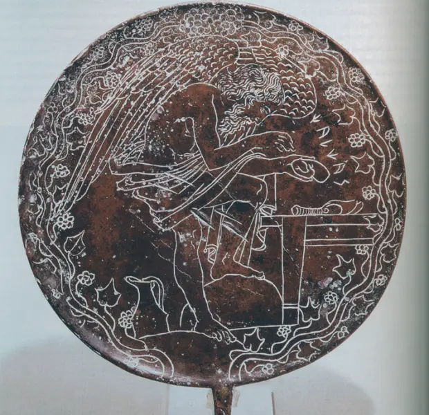 Specchio etrusco con l'aruspice Chalcas che esamina un fegato.V sec. a. C. Bronzo. Museo Gregoriano Etrusco. Roma, Palazzi vaticani